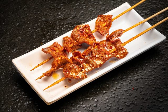 川味秘制鸡胗(3pcs) Sichuan-style chicken gizzard skewers (3 pcs)